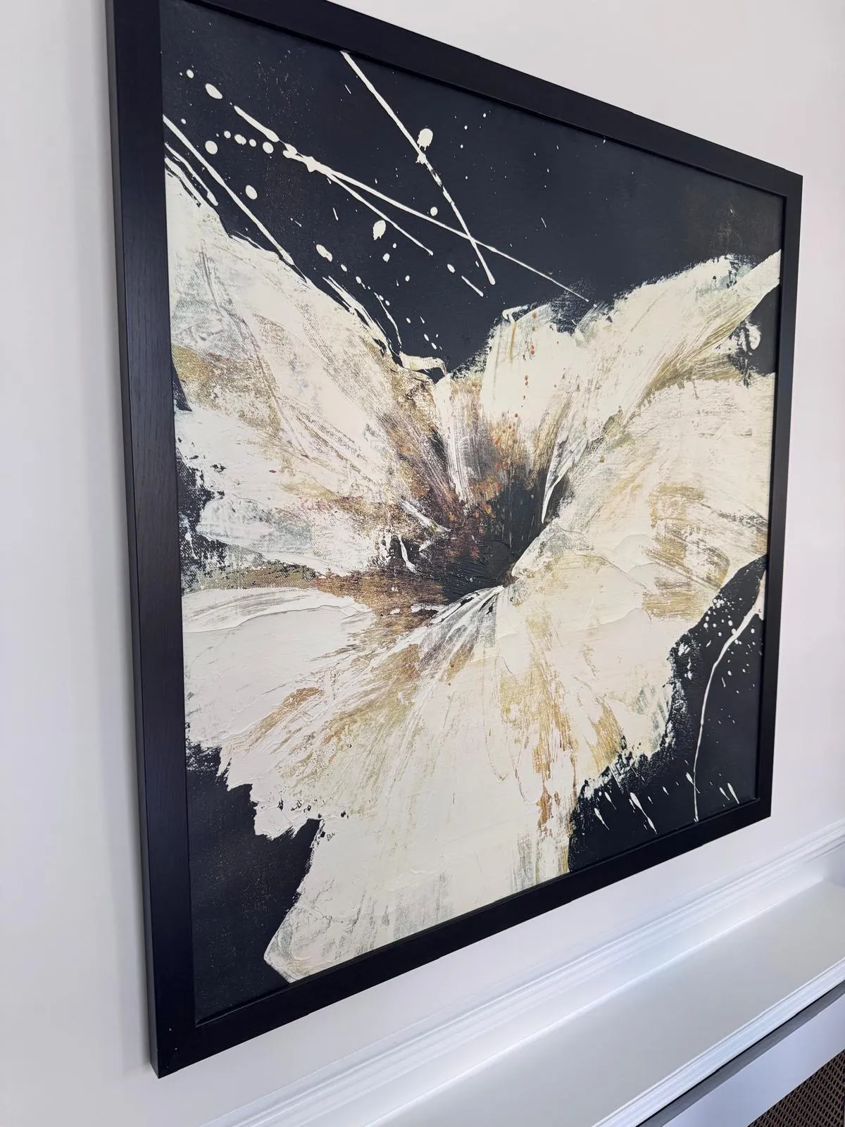 Second perspective of the painting on a wall