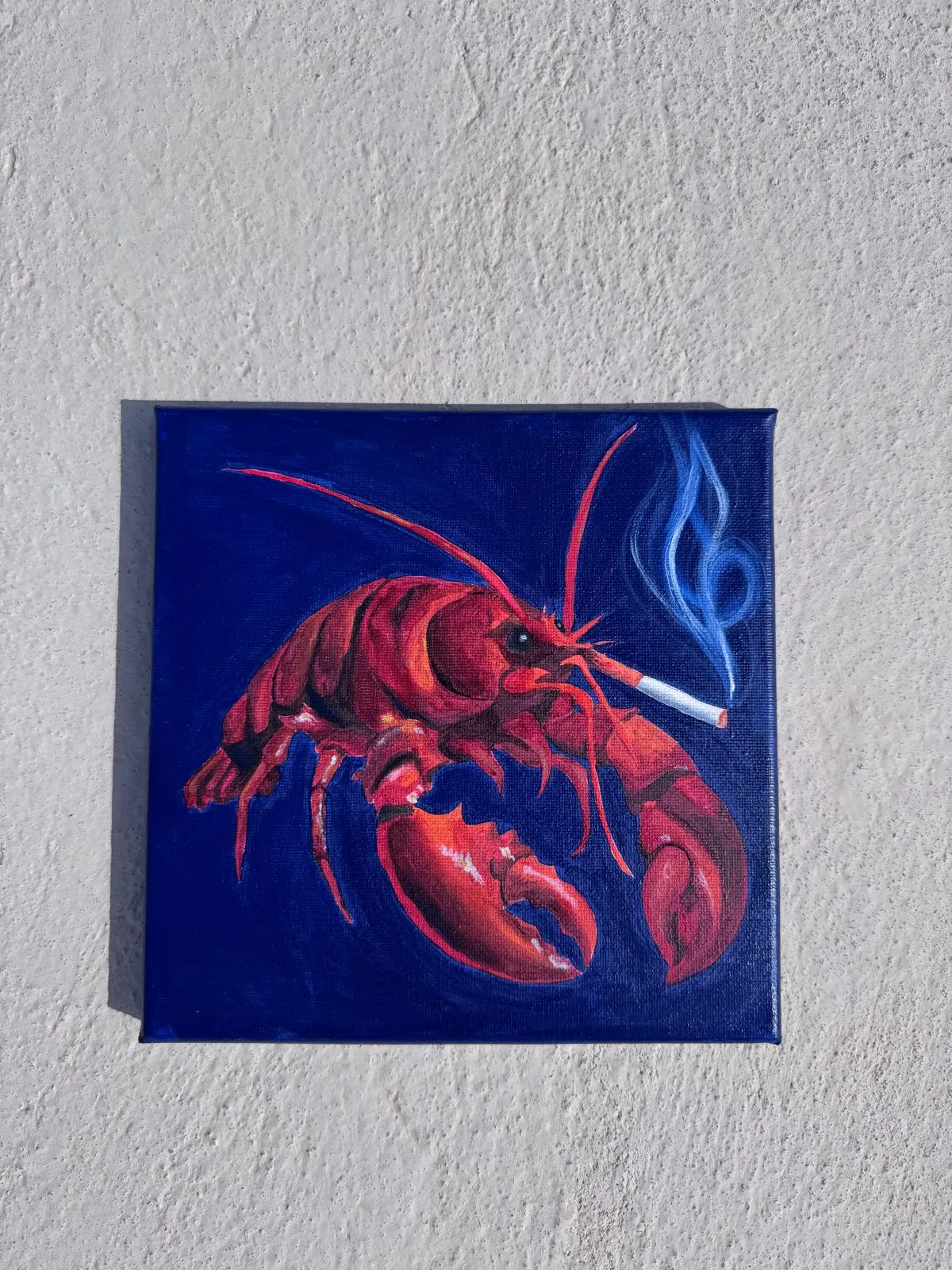 Realistic style lobster smoking a cigarette on a deep blue background