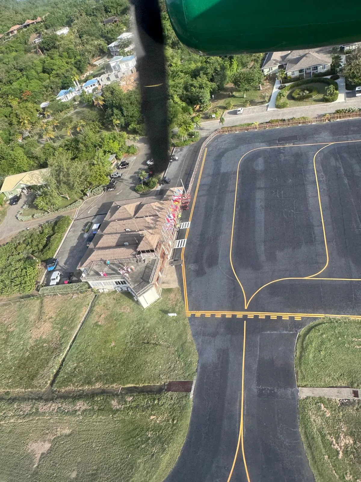 View from the wing of a plane of the airport terminal